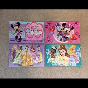 8 Disney jigsaw puzzles.